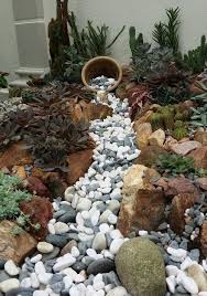 Rock Garden White Rock Pouring From Pot