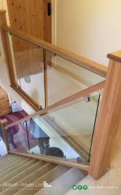 Wooden Handrail With A Glass Barade