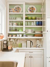 white kitchen cabinets with green