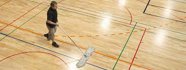 a hillyard com images dust mopping gym floor b