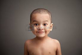 indian baby boy smiling by