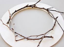 Here's a fun craft project using twigs from our backyard. Twig Wreath Infarrantly Creative
