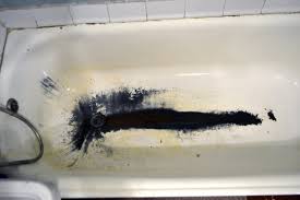 what causes yellow stains in bathtub
