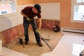 remove a tile floor and underlayment