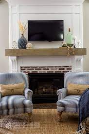 modern mantel decor with a tv 7 ways