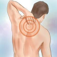 sharp upper back pain between the