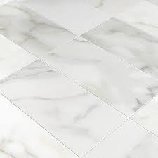 Calacatta Gold Honed Marble Tile