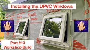 installing upvc windows into a timber