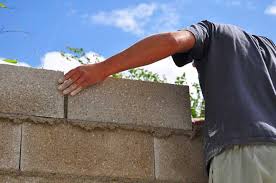 how to cover exterior cinder block walls