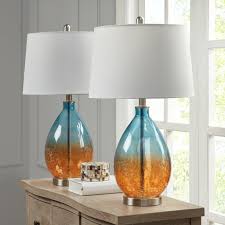 Buy the floor and table lamp set of your dreams here at destination lighting. Ocean Sunset Glass Table Lamps Set Of 2 Caron S Beach House