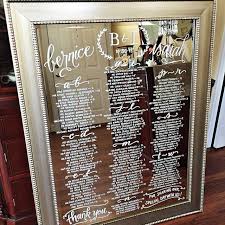 Mirrored Seating Chart In Hand Calligraphy Wedding