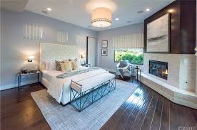 It's a yellowish green that again, use natural textures like wood, jute and linen as much as you can. 75 Primary Bedrooms With Hardwood Flooring Photos Home Stratosphere