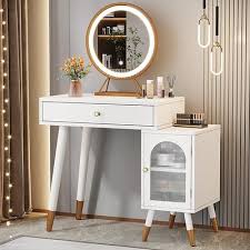 white vanity with lighted mirror