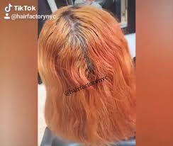can i tone my orange hair with blue dye
