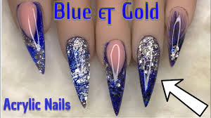 blue gold sparkle acrylic nails