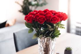 bouquet of red roses in a crystal vase