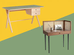 This distressed birch secretary desk folds down and opens up to reveal an enormous amount of storage in a small space. Best Home Office Desks Stylish And Functional Designs With Storage The Independent