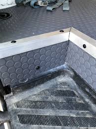 Thick rubber decking will prevent slips, offer comfort, and keep your outdoor floors in pristine condition! Brian S Moto Van Project Garageflooringllc Com Enclosed Trailers Van Flooring