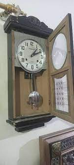 Antique Champion Pendulum Wall Clock