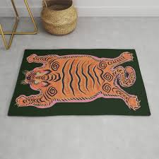 wild tiger rug rug by zoopoo society6
