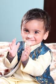 smiling indian baby boy in traditional