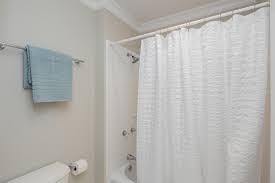 clean a shower curtain and liner