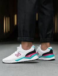 A bold look with a comfortable feel, these retro shoes are available for both women and men. New Balance X90 New Balance Shoes Men New Balance Sneakers Stylish Sneakers