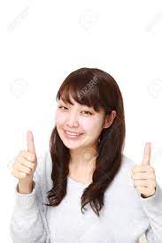 Portrait Of Young Japanese Woman With Thumbs Up Gesture Stock Photo,  Picture and Royalty Free Image. Image 41030136.