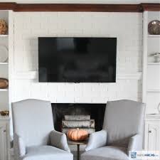 how to hide tv wires over a fireplace