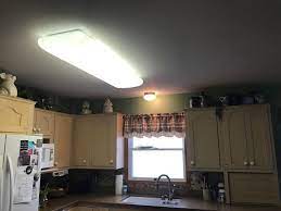 Fluorescent light fixtures these days are more likely to be found in utility situations, as with this it might be in a garage or basement workshop, or perhaps underneath your upper kitchen cabinets troubleshooting a fluorescent light. Ideas For Replacing A Kitchen Fluorescent Light Fixture Hometalk