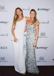 gisele and twin sister have rare red