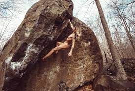 Naked rock climber