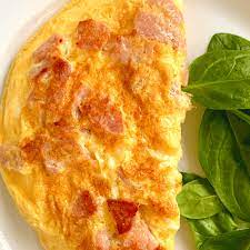 an omelette with cheese and bacon