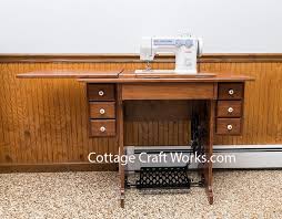 amish treadle cherry sewing cabinet for
