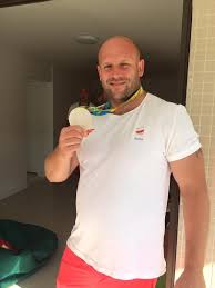 All he ever wanted came true. Olympian Piotr Malachowski Sells Medal To Save A Life Attn