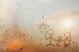 A Family Of Raindrops On A Glass Window