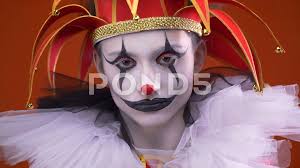 creepy jester with makeup and