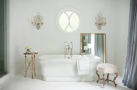 Mirror And Brass Wall Sconces