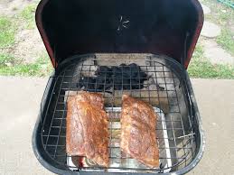 smoking ribs on a small charcoal grill
