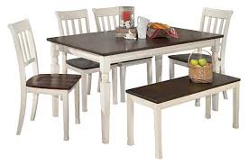Dark charcoal gray and matte black. Whitesburg Dining Table And 4 Chairs And Bench Ashley Furniture Homestore