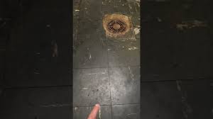 what do asbestos floor tiles look like