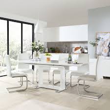 Glass dining tables a modern glass dining table helps make a smaller dining room feel bigger and is a great solution for highlighting a statement area rug placed beneath the table. Tokyo White High Gloss Extending Dining Table With 4 Perth White Leather Chairs Furniture And Choice