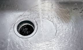 how to unclog a garbage disposal the