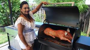 roasting a whole ling pig in my