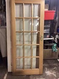 Light Oak 15 Panel Bevel Glass Door