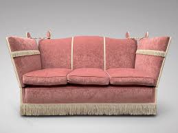 pink upholstered hump back knole sofa