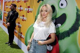 Dove Cameron Looks Gorgeous, Promotes Sustainability At 