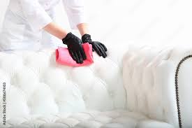 cleaning indoors white leather sofa