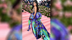 Dua Lipa Rocks A Plunging Versace Gown At The 2019 Met Gala