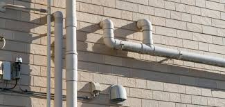 How To Hide Exterior Plumbing Pipes